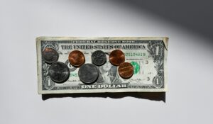Dollar bill and coins