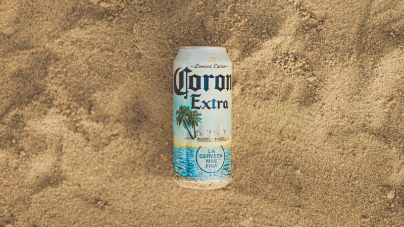 Corona can on the sand