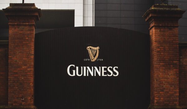 Guiness logo on a large gate