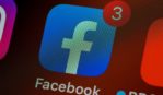 Facebook logo on smartphone screen