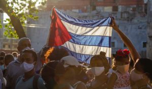 People raising Cuban flag