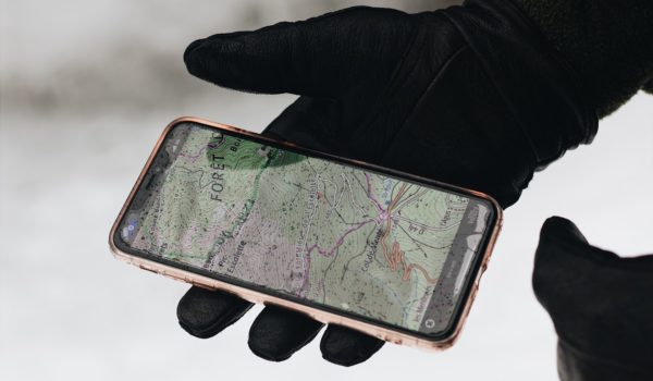 A person open a GPS on his smartphone