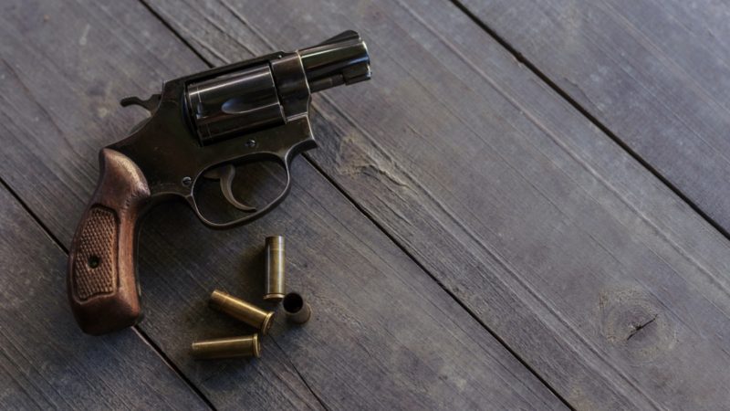 A revolver and bullets