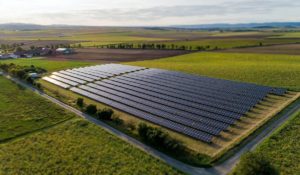 Solar farm in a green field