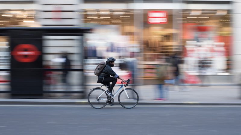 Cyclist on the road with background blurred