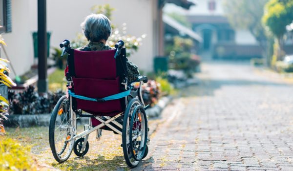 Elderly person in wheel chair