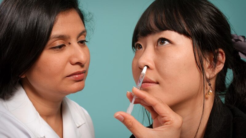 Person receiving nasal spray